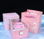 Elegant Rotating Rose Jewelry Box