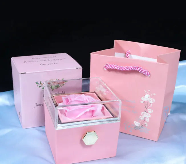 Elegant Rotating Rose Jewelry Box