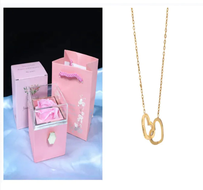 Elegant Rotating Rose Jewelry Box